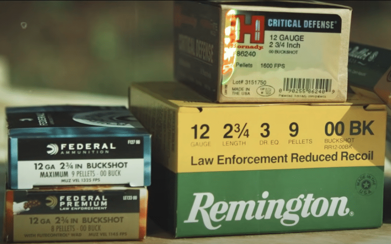 four boxes of different types of shotgun shells 