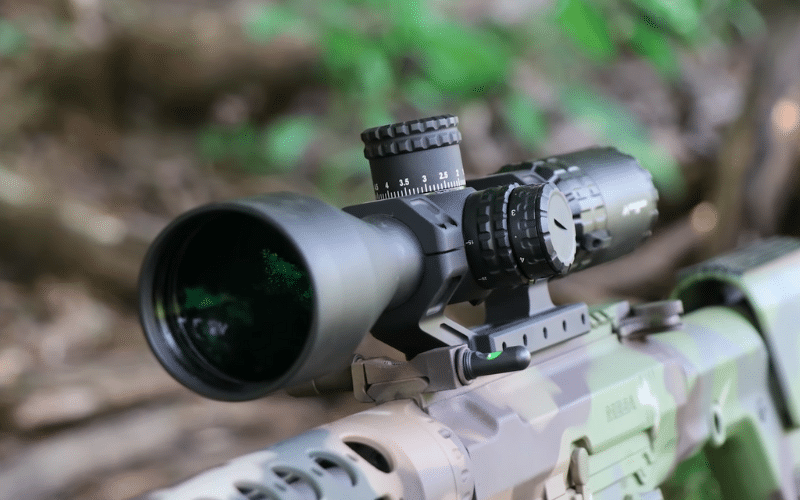 Primary arms scope on camo patterned gun