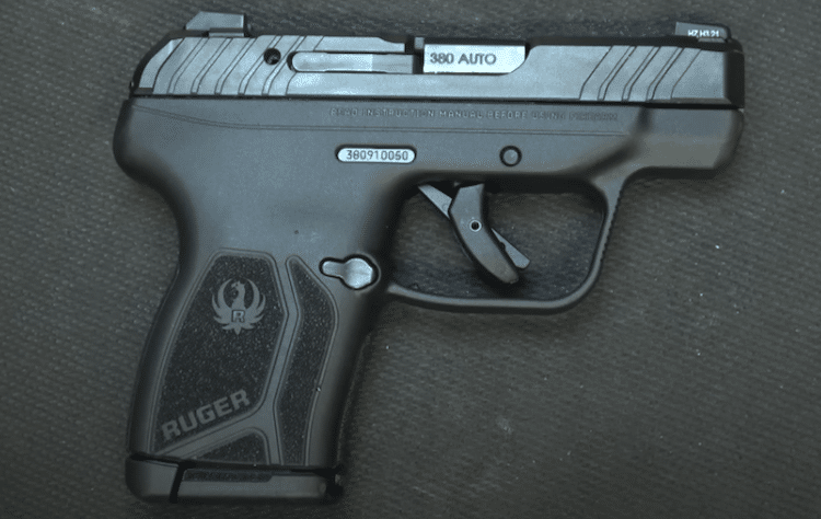 Ruger LCP pocket pistol on a gray background
