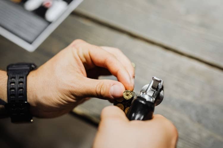 Hand loading a revolver

