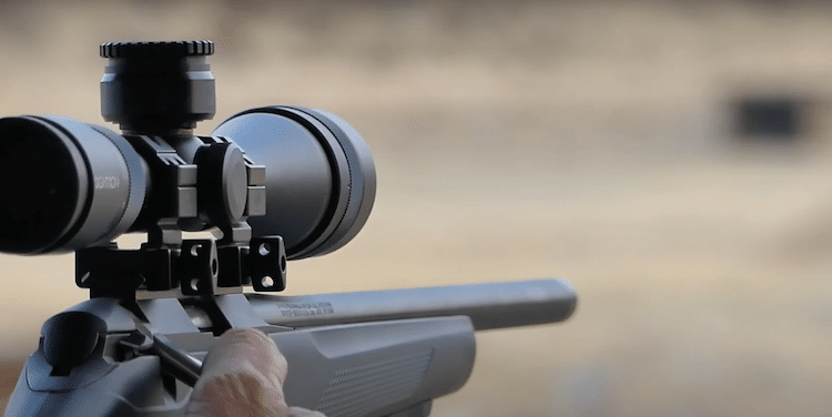 A scope mounted onto a hunting rifle