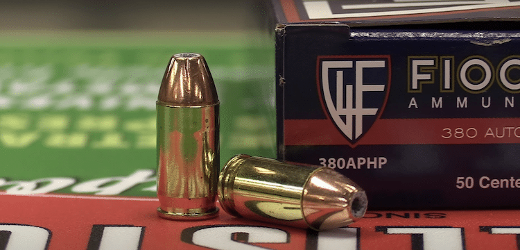 9mm bullets beside its box