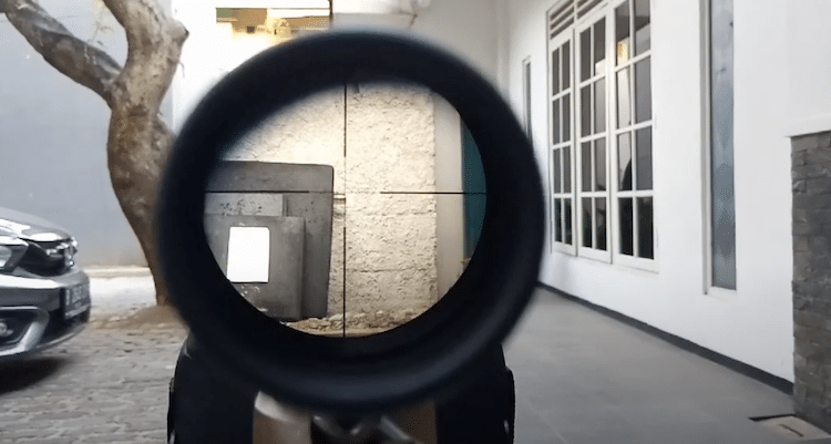 Zoomed in view of the wall seen through a scope lens