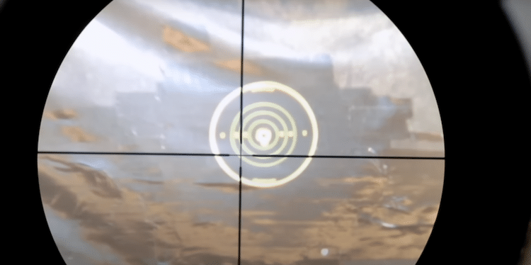 Zoomed in view of the target and the reticle of a scope