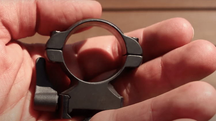 Scope ring on the palm of a hand