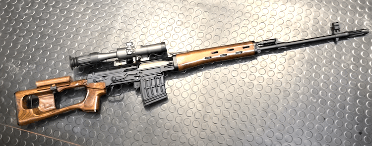 CYMA AK SVD Sniper Rifle and gray background