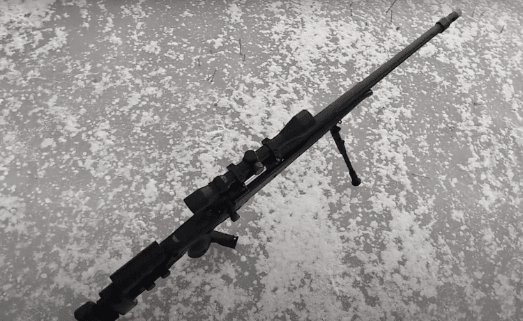 Well MB12 Heavy Weight Airsoft Sniper Rifle with a mounted scope
