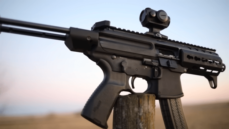 Sig Sauer MPX K on a post